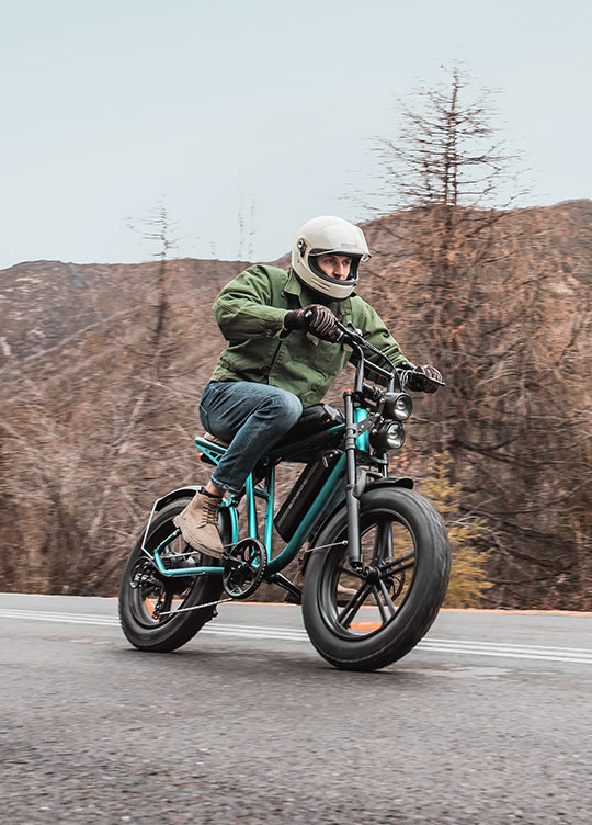 a man riding an engwe m20 e-bike