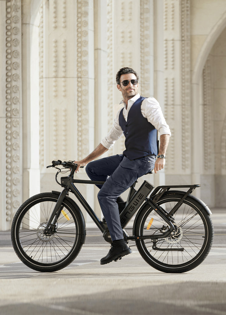 a man sitting on a black engwe p275 pro urban e-bike